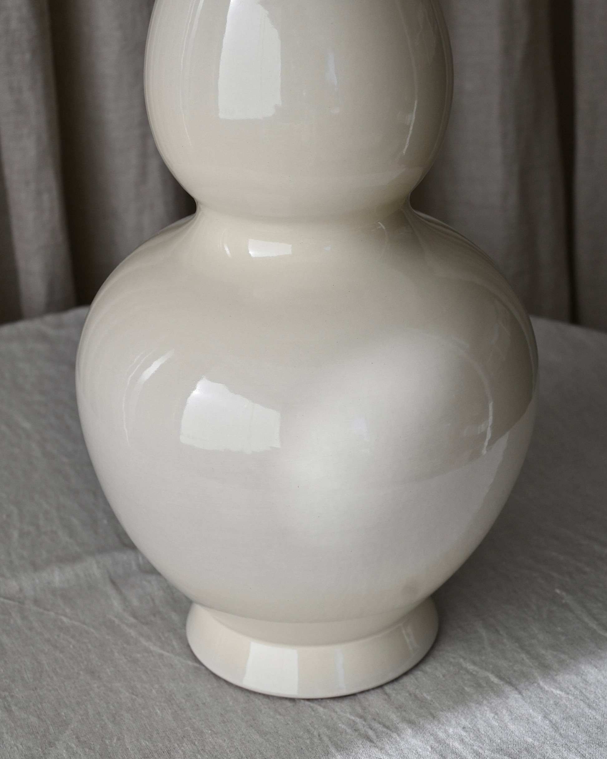 Base Caspio L en cerámica beige