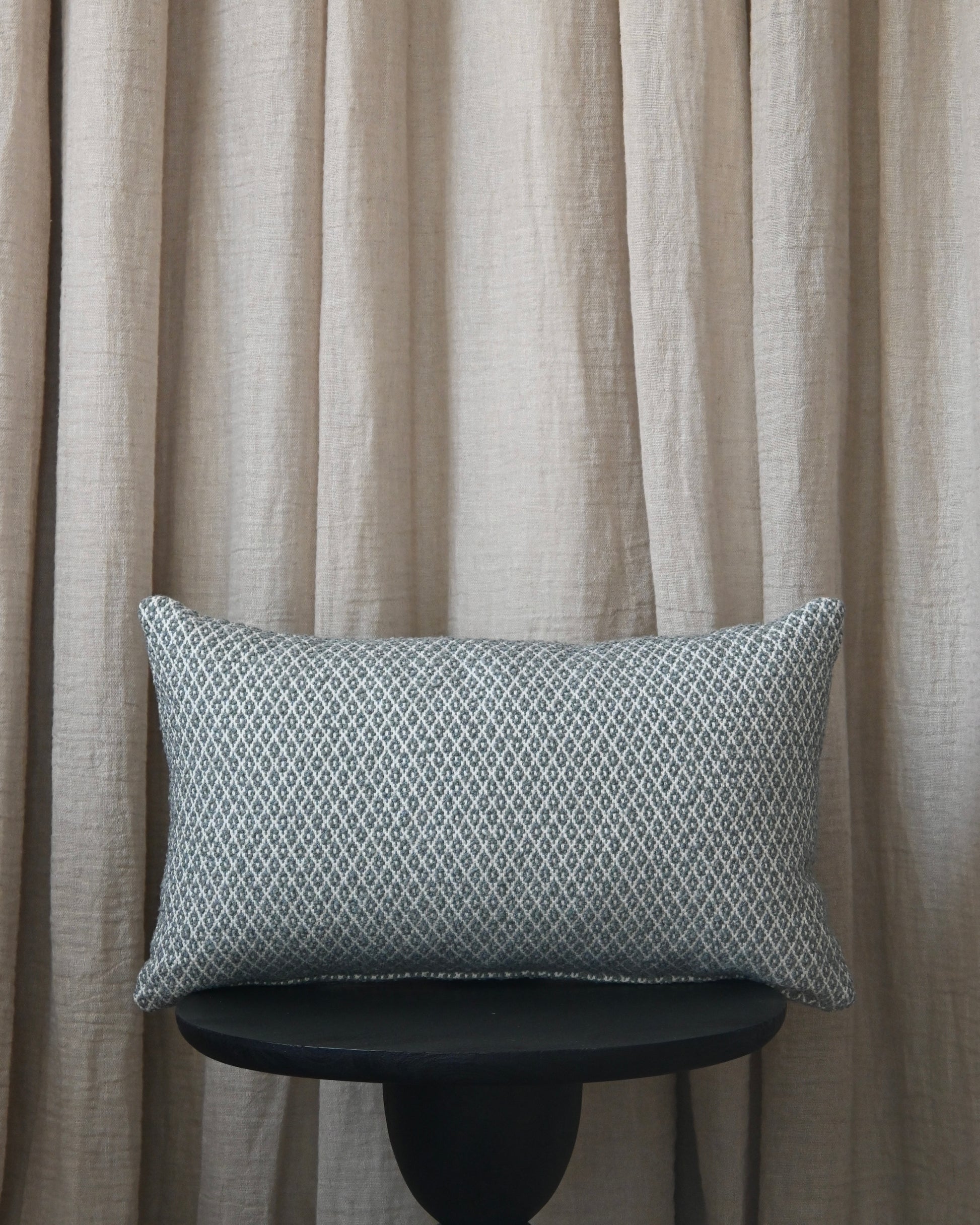 Almohadón rombos azul