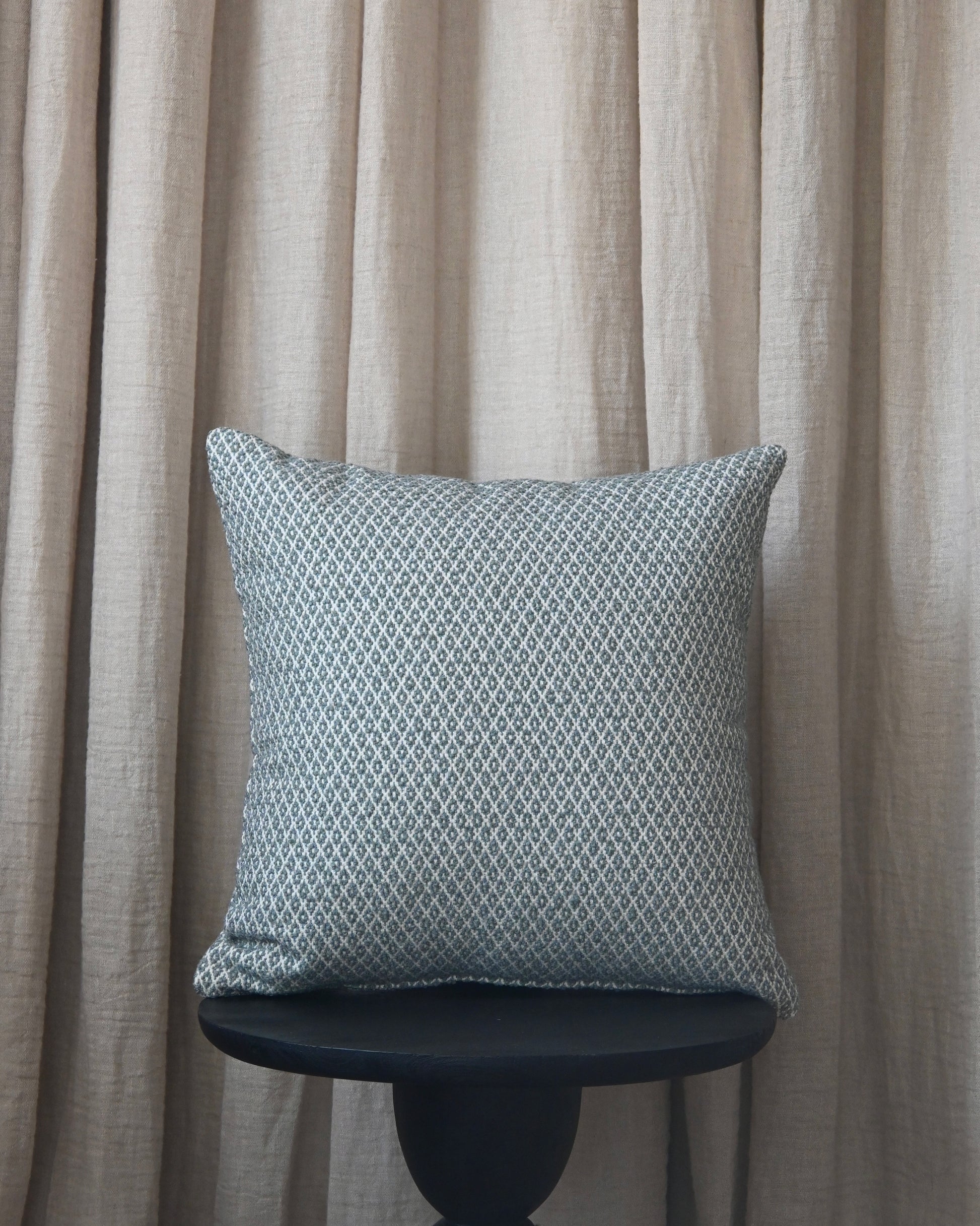 Almohadón rombos azul