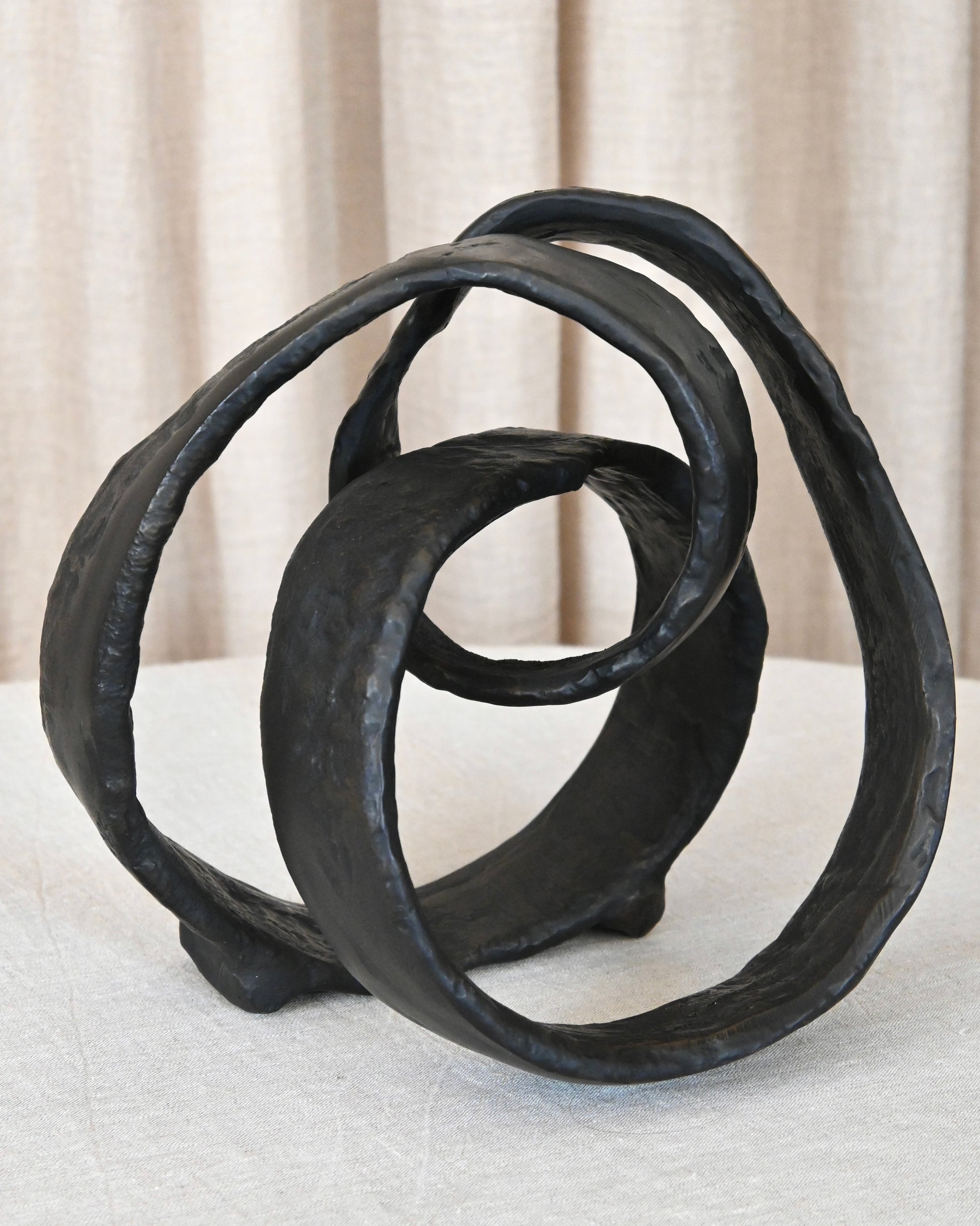 Escultura metal abstracta