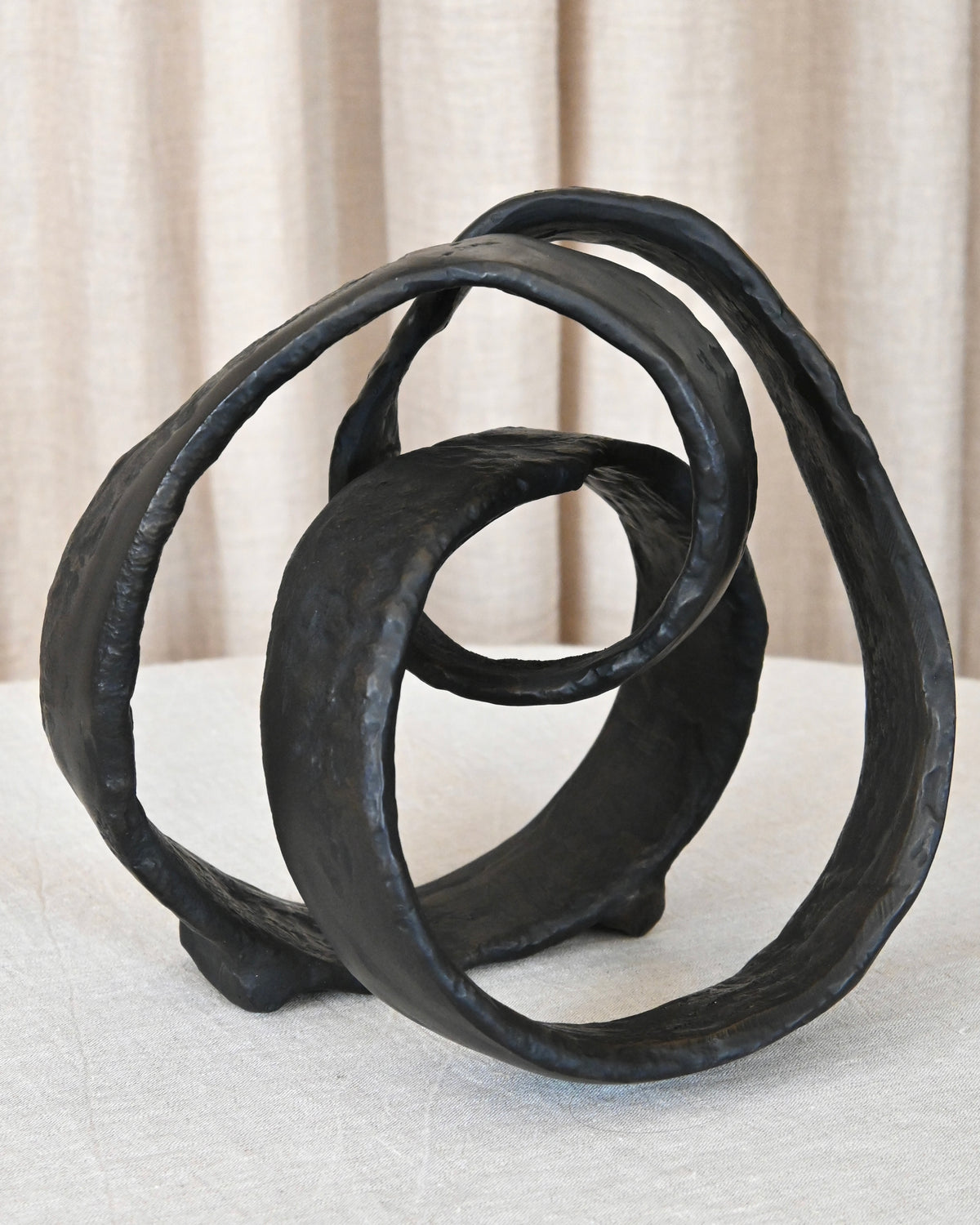 Escultura metal abstracta