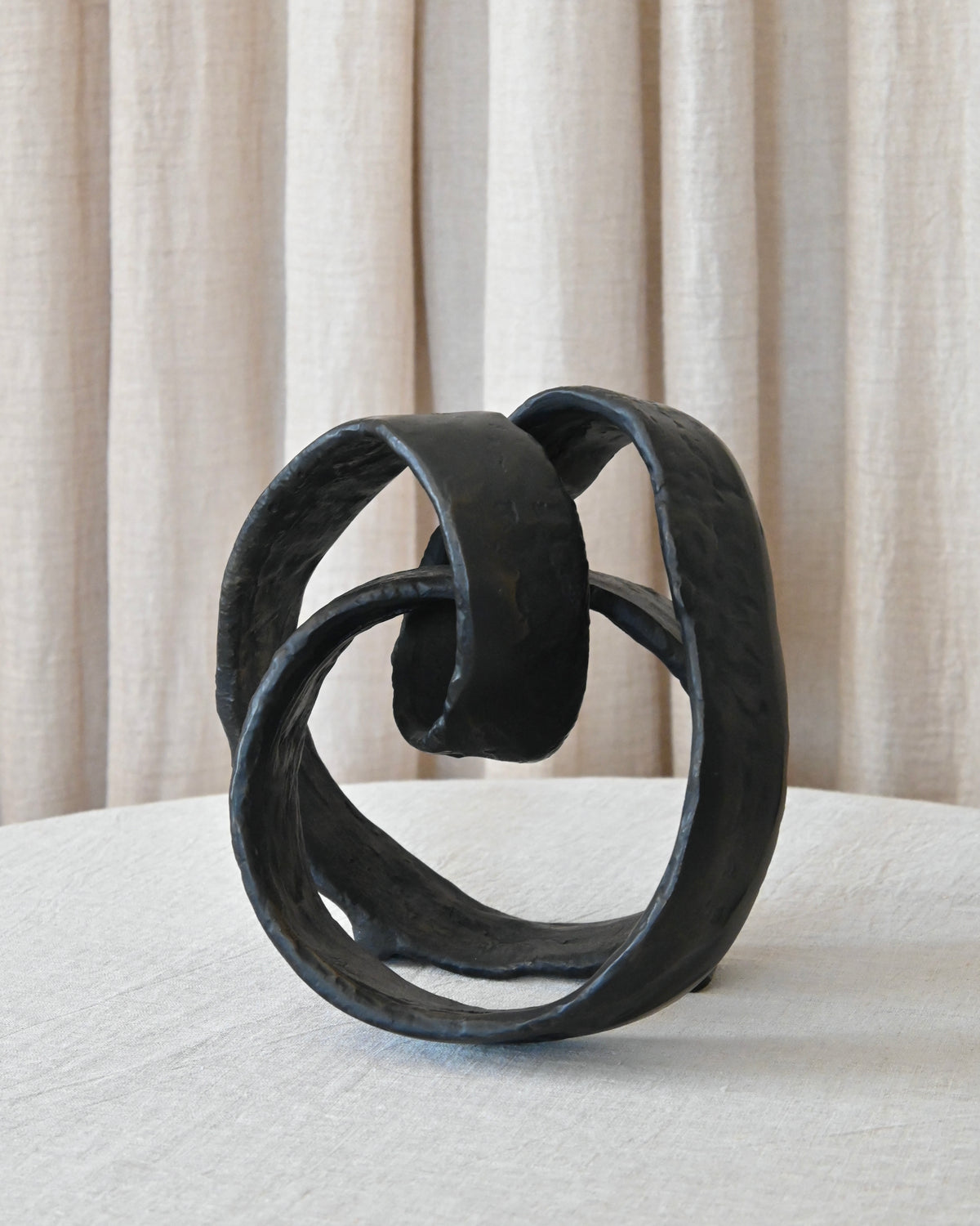 Escultura metal abstracta