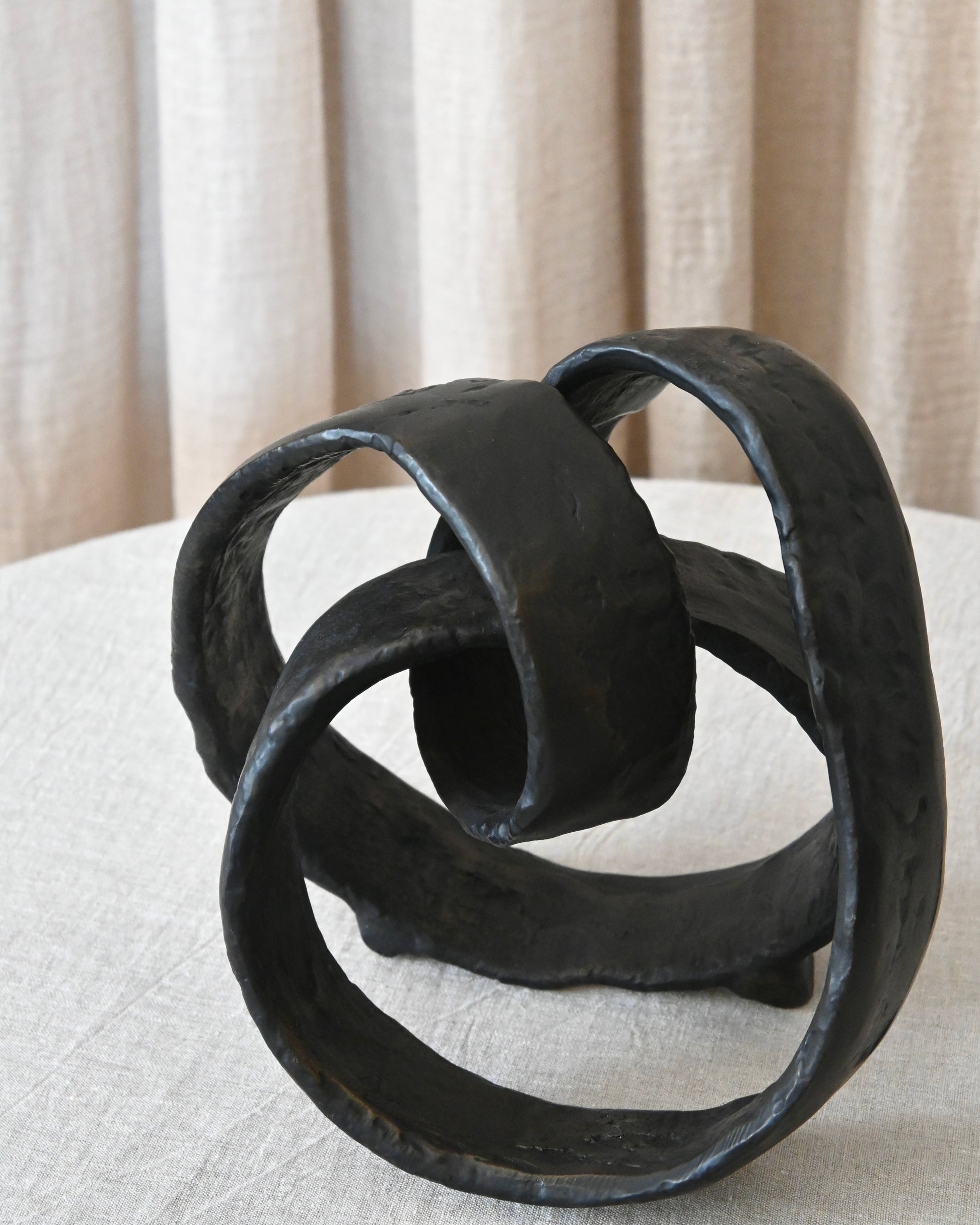 Escultura metal abstracta