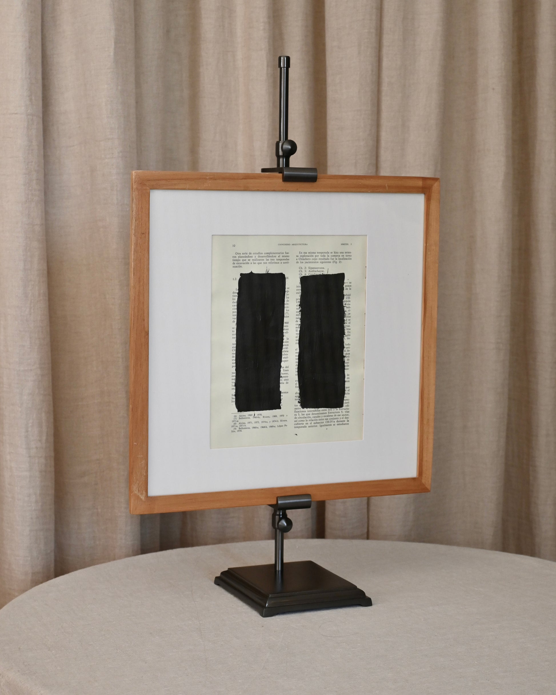 Portacuadros de latón oscurecido en negro