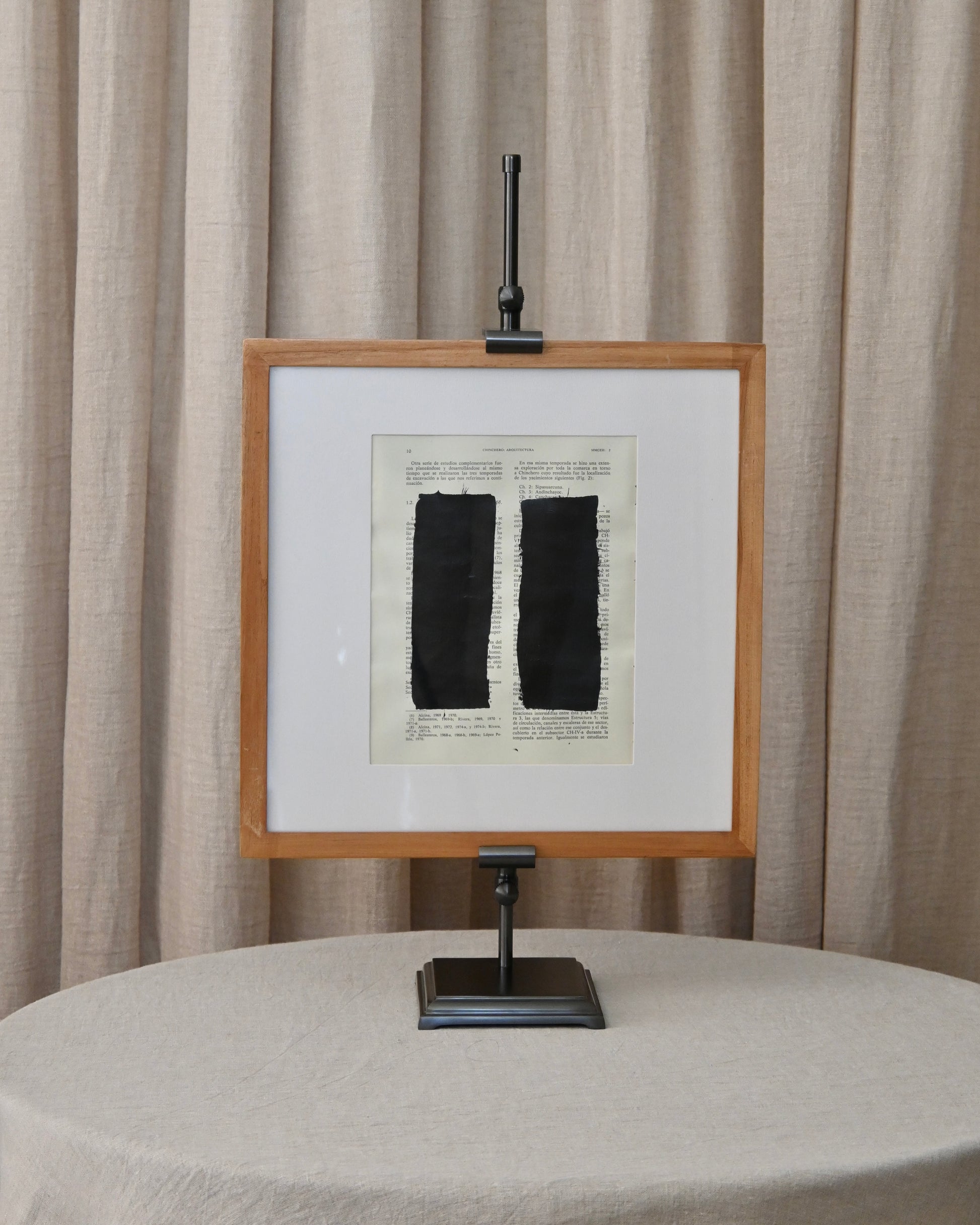 Portacuadros de latón oscurecido en negro