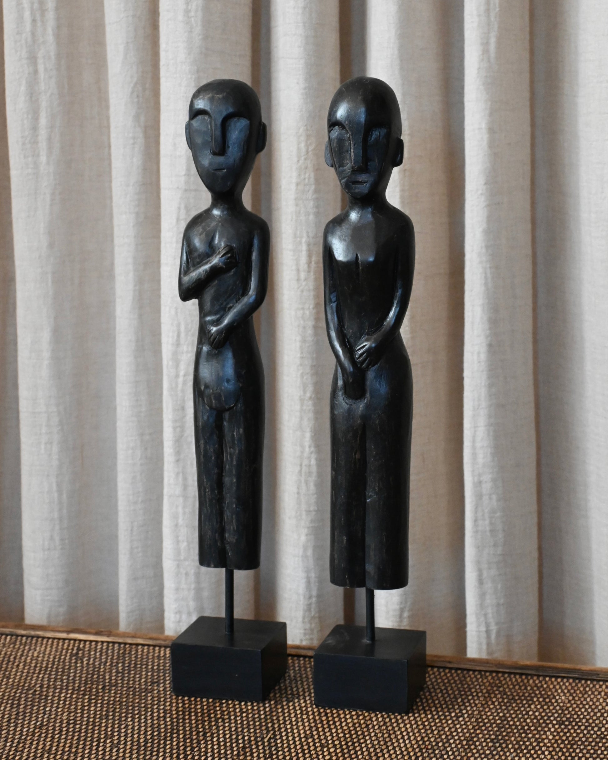Pareja de esculturas Raíz