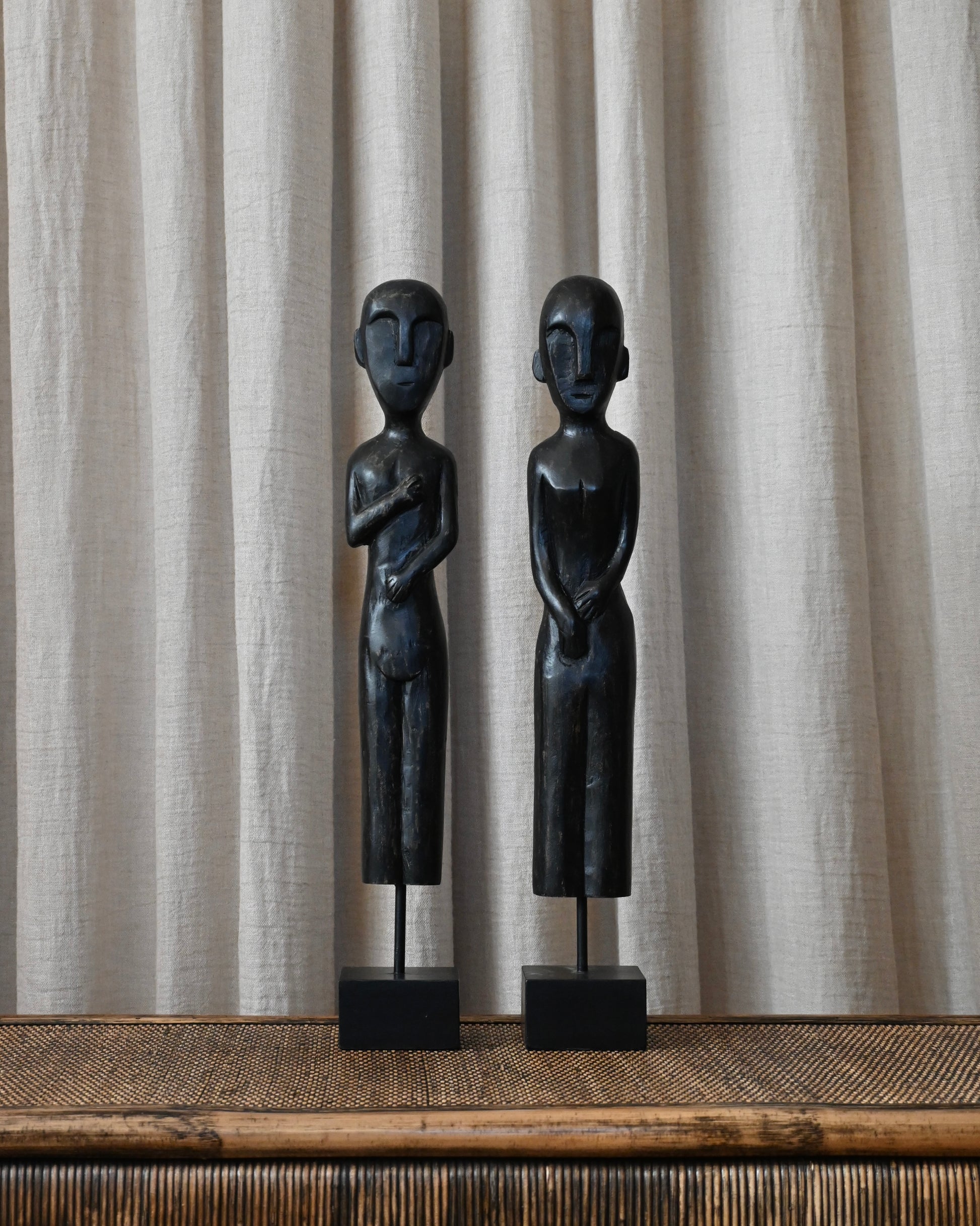 Pareja de esculturas Raíz