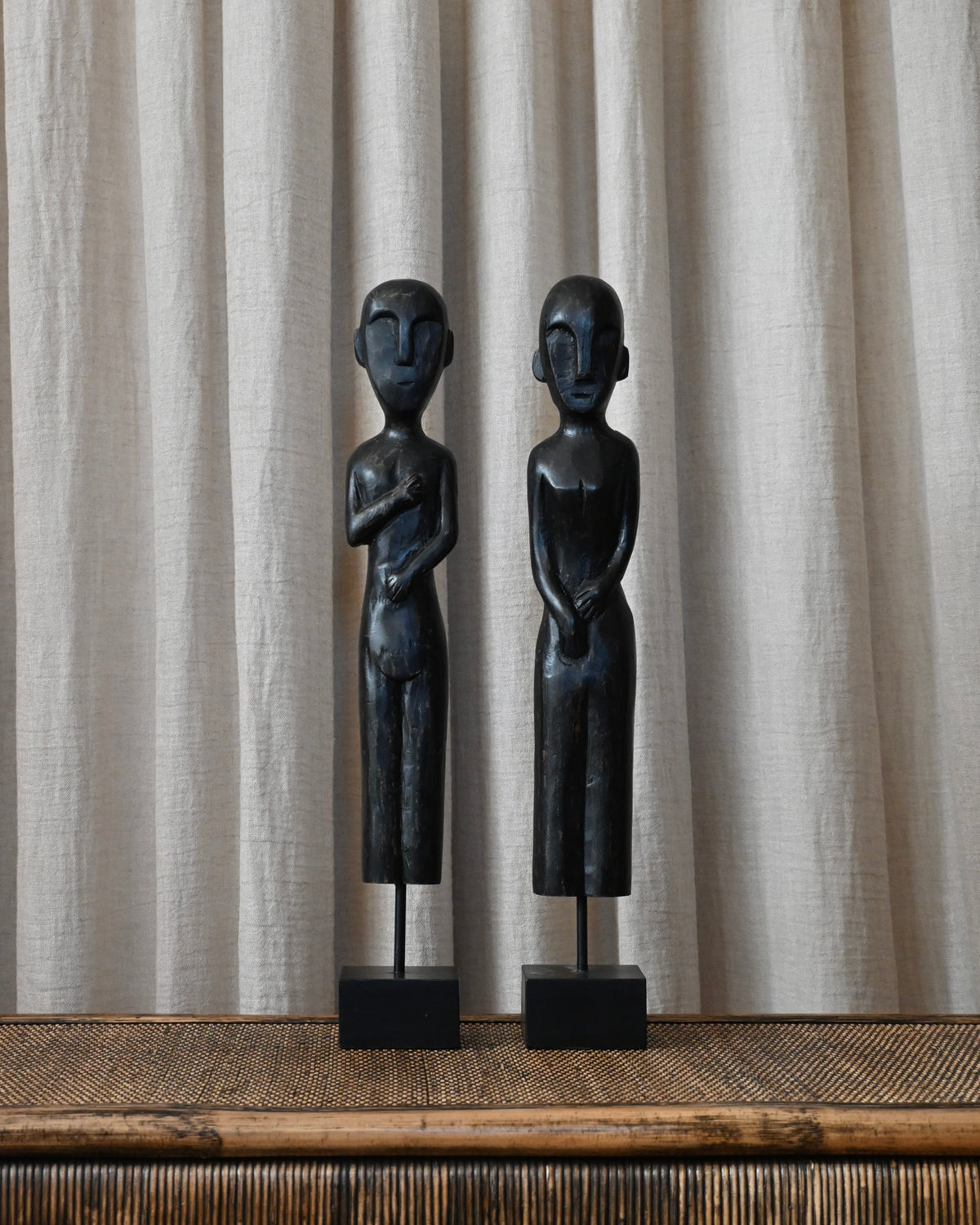 Pareja de esculturas Raíz